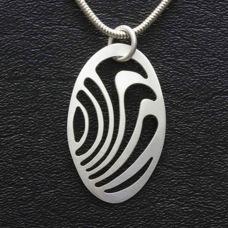 pierced metal pendant